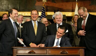 Mitt Romney, then governor of Massachusetts, signed a landmark health care reform bill into law at Faneuil Hall on April 12, 2006.