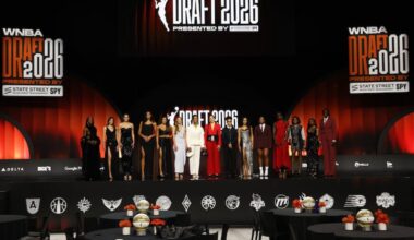 Players pose on stage before the WNBA draft on Monday in New York.