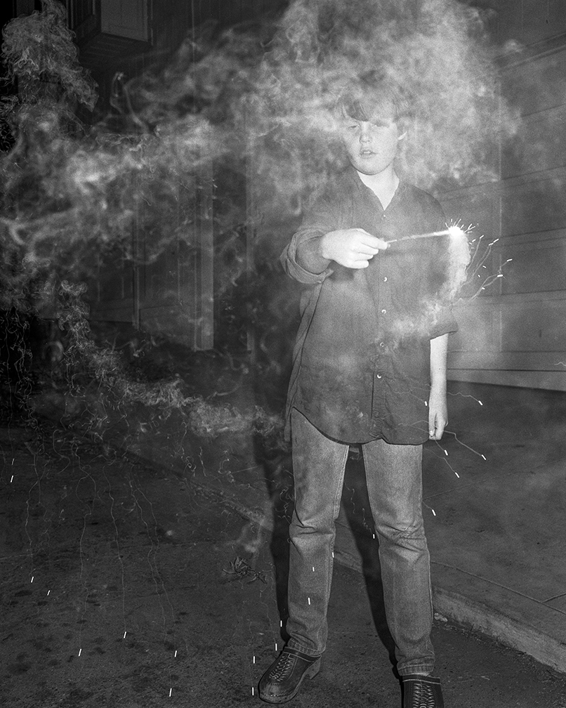 XLMP034 Boy with Sparkler, 1988, Mimi Plumb photo