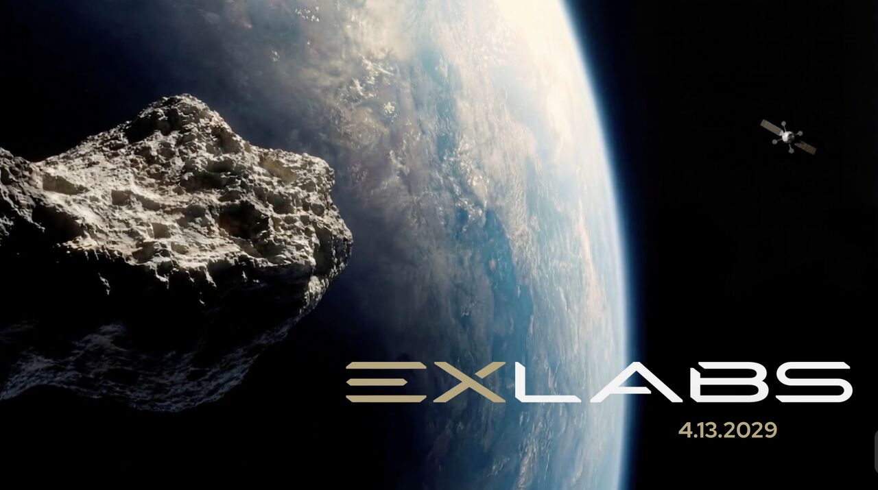 a rocky asteroid zooms by earth as a cylindrical spacecraft with two wing-like solar arrays flies nearby