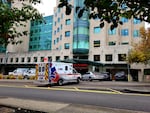 FILE - An ambulance pulls into the entrance driveway for OHSU's emergency department on Wednesday, Oct. 27, 2021.