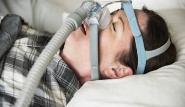 a woman sleeping with anti snoring chin strap 2026 01 07 23 56 45 utc