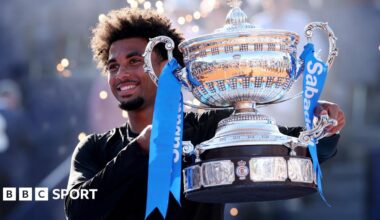 Arthur Fils holds the trophy after winning in Barcelona