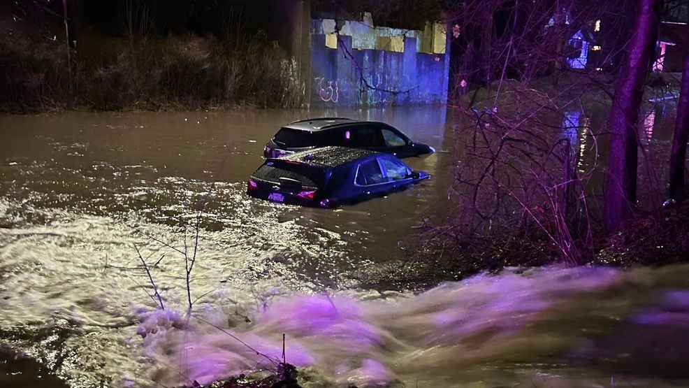 Two cars are stuck in flooding on Elmgrove Road in Greece after a storm Tuesday, March 31, 2026. (Photo provided by Linda Tyree)