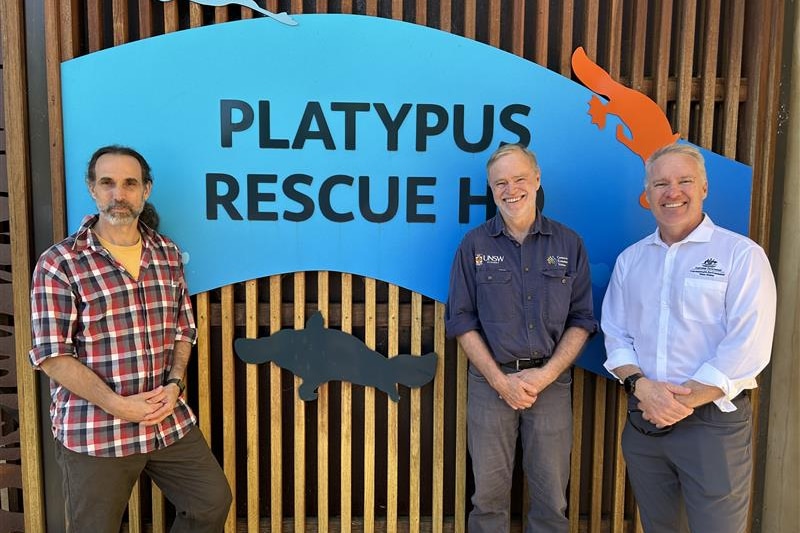 three men stand outside the Platypus Rescue headquarters