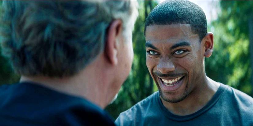 Aaron Pierre smiles at Don Johnson's evil sheriff in Rebel Ridge