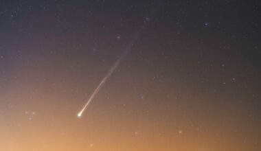 See Comet PanSTARRS glow above a false dawn in stunning new photo
