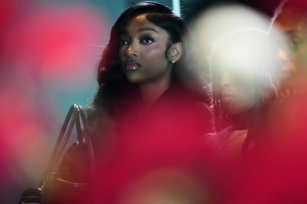 Angel Reese at a news conference.