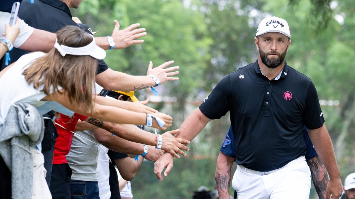 Jon Rahm greets fans