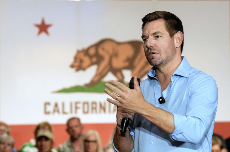 California gubernatorial candidate, Rep. Eric Swalwell, D-CA, appears at a town hall meeting in Sacramento, Calif., Tuesday, April 7, 2026. (AP Photo/Rich Pedroncelli)