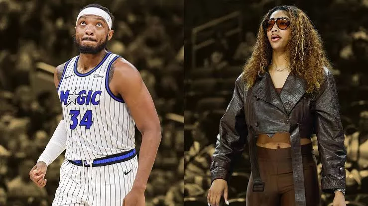 Angel Reese and Wendell Carter Jr.