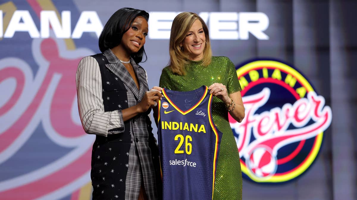 WNBA Commissioner Cathy Engelbert (right) poses for photos with Raven Johnson who was selected tenth overall by the Indiana Fever during the 2026 WNBA Draft.Brad Penner-Imagn Images