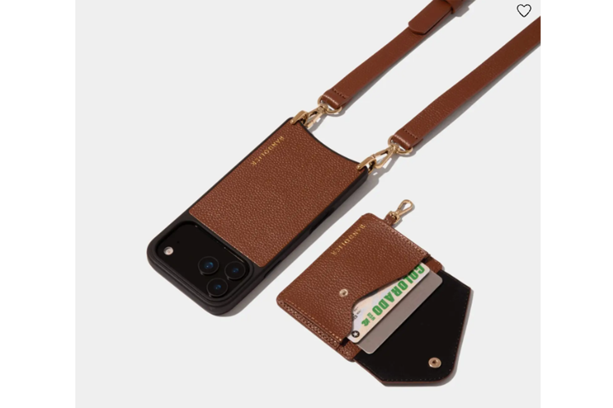 A brown leather phone case with a shoulder strap, and a matching wallet holding cards.