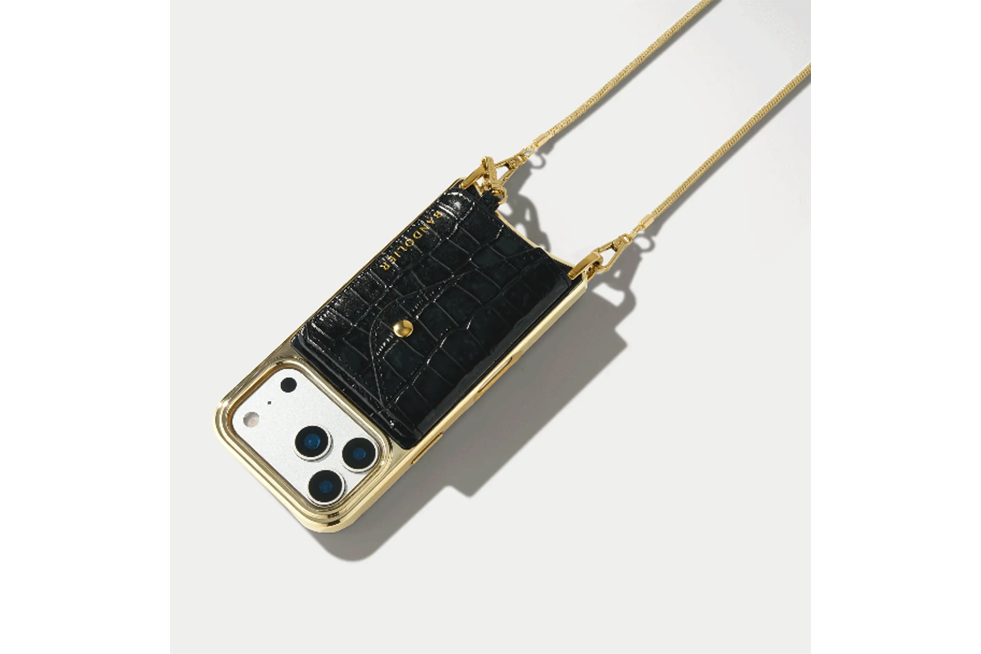Black crocodile-embossed smartphone case with a gold chain strap.
