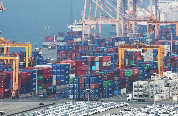 Containers bound for export are stacked at a port in Pyeongtaek, Gyeonggi Province, April 1. Yonhap