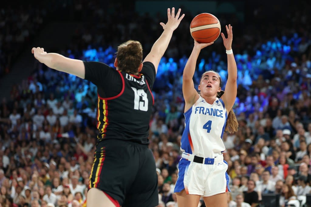 Marine Fauthoux (r.) attempt a shot during a Team France game at the Paris Olympics in 2024. Getty Images