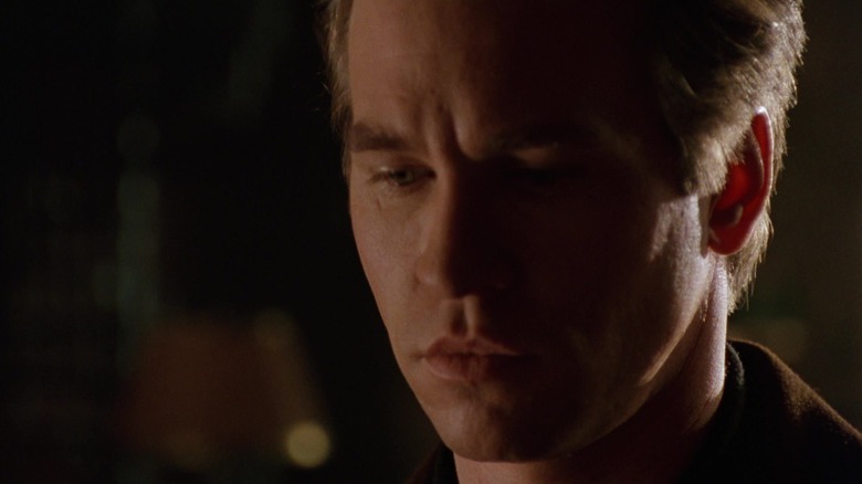 Val Kilmer's Bruce Wayne looks troubled in closeup in Batman Forever