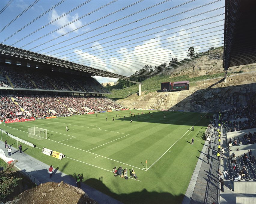 View of Braga Municipal Stadium showing two opposing stands and the exposed quarry face behind the pitch