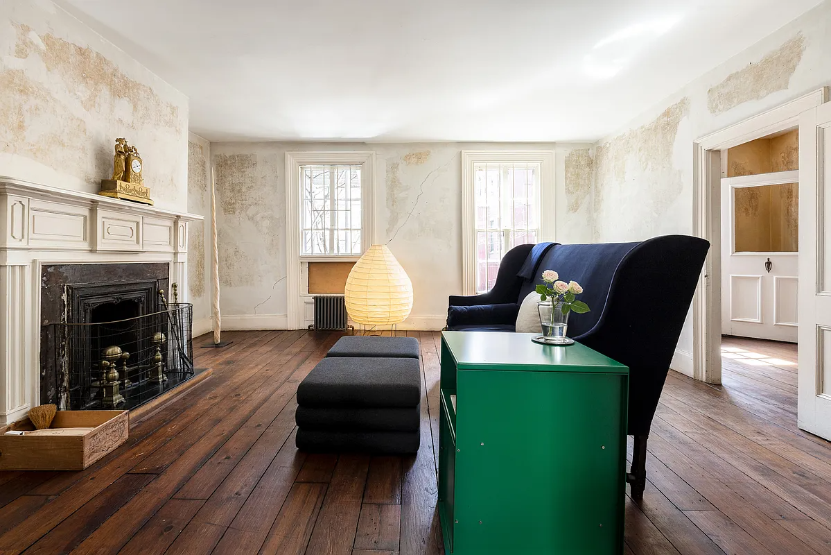 parlor with wood mantel