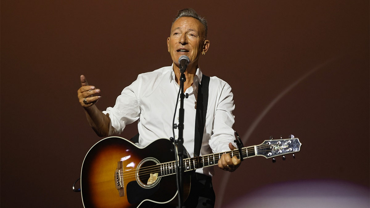 Bruce Springsteen performing on stage at TCL Chinese Theatre in Hollywood