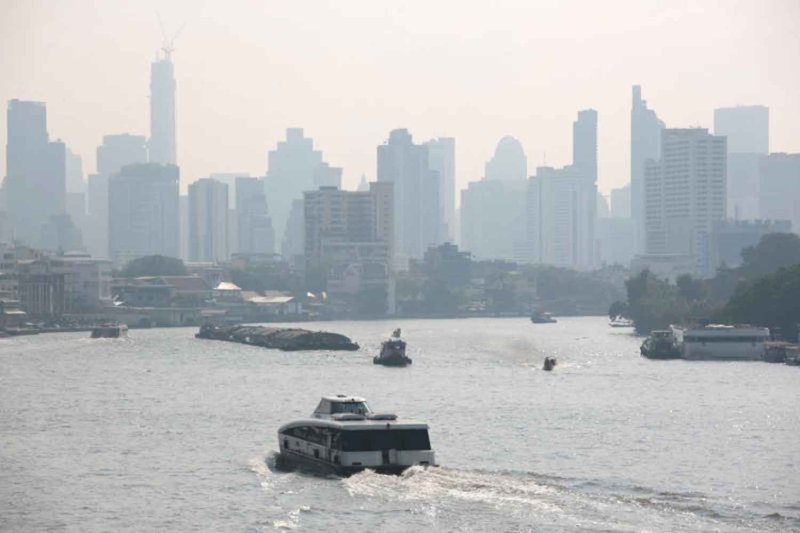 Smog hangs over the Chao Phraya River in Bangkok in January. Chanat Katanyu
