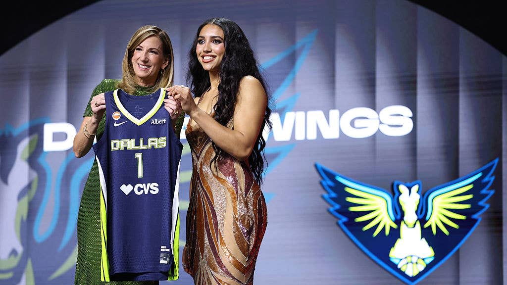 WNBA Commissioner Cathy Engelbert poses for a photo with Azzi Fudd after being drafted first overall by the Dallas Wings during the 2026 WNBA draft.Photo by David L&period; Nemec&sol;NBAE via Getty Images