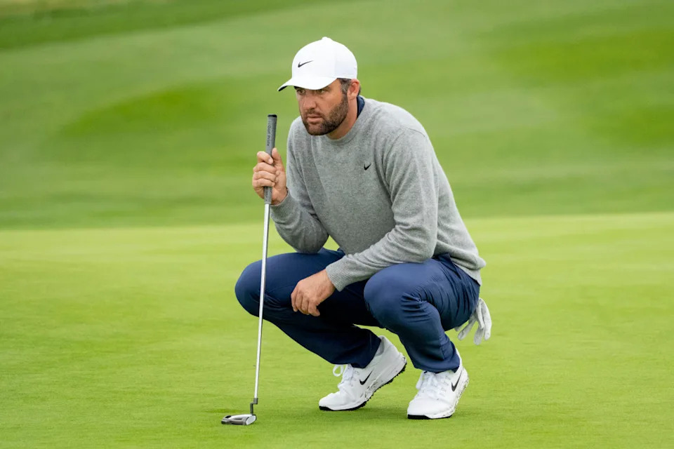 Scottie Scheffler lines up his putt on the eighth hole during the third round of the AT&T Pebble Beach Pro-Am golf tournament at Pebble Beach Golf Links on Feb. 14, 2026.Kyle Terada-Imagn Images