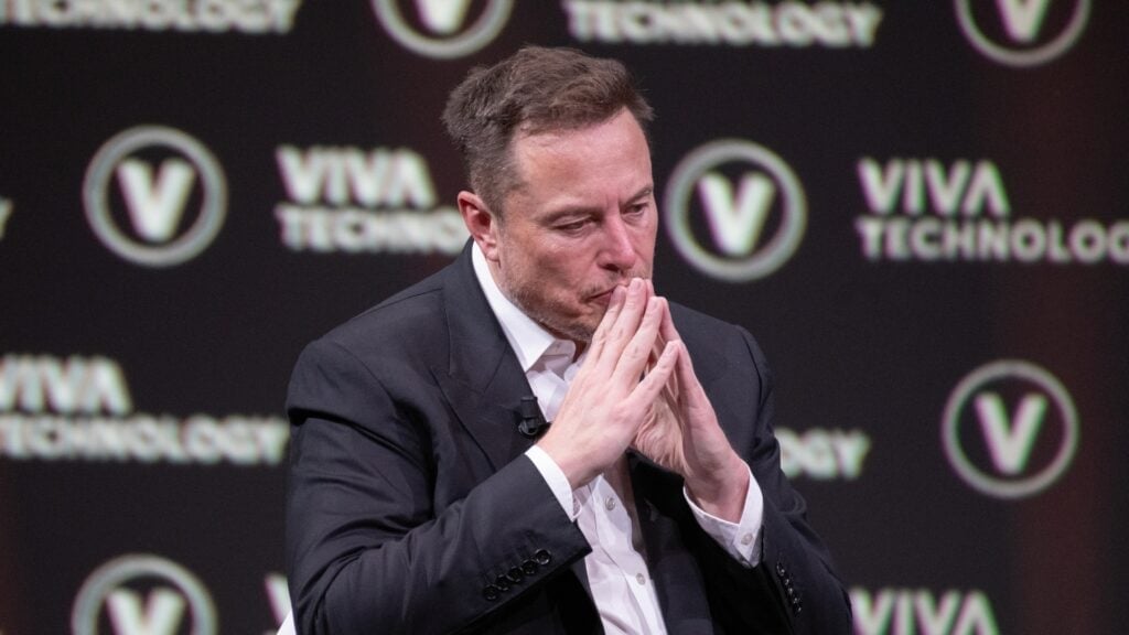 Elon Musk Says 'If AI/Robots Increase Output, Then You Must Issue Dollars To People or There Will Be Massive Disinflation'