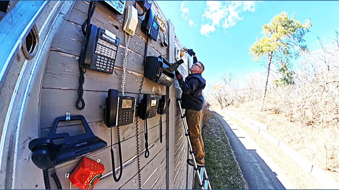 'Phone Banksy' expands quirky public art project on freeway noise barrier