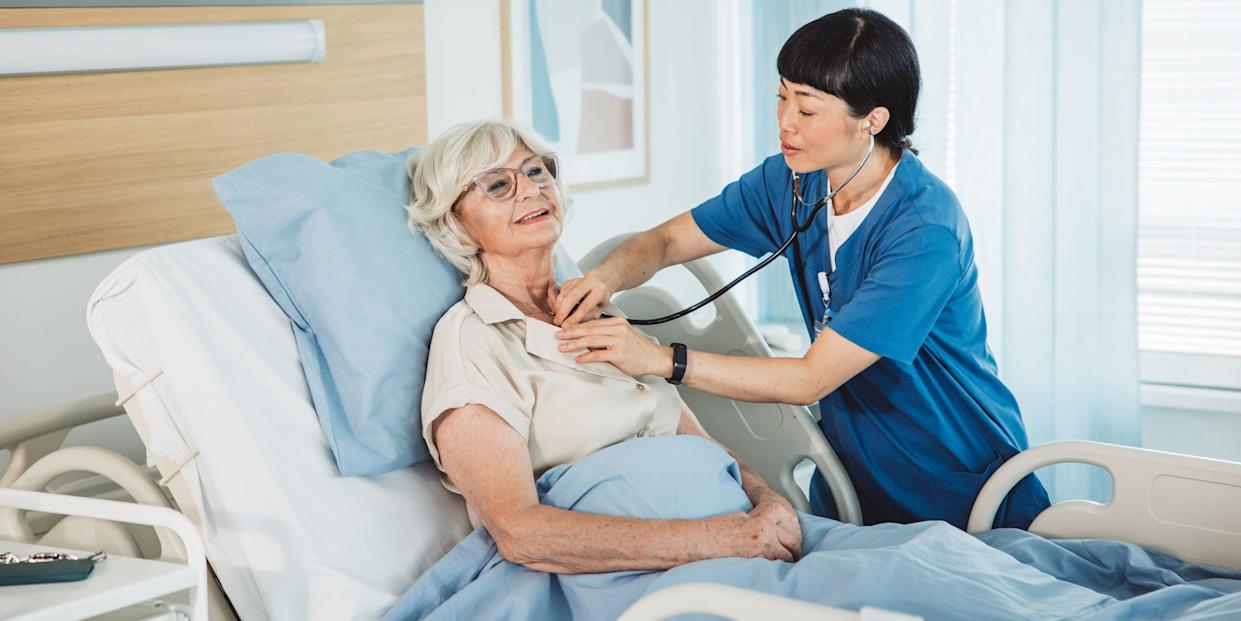 Senior woman in hospital bed