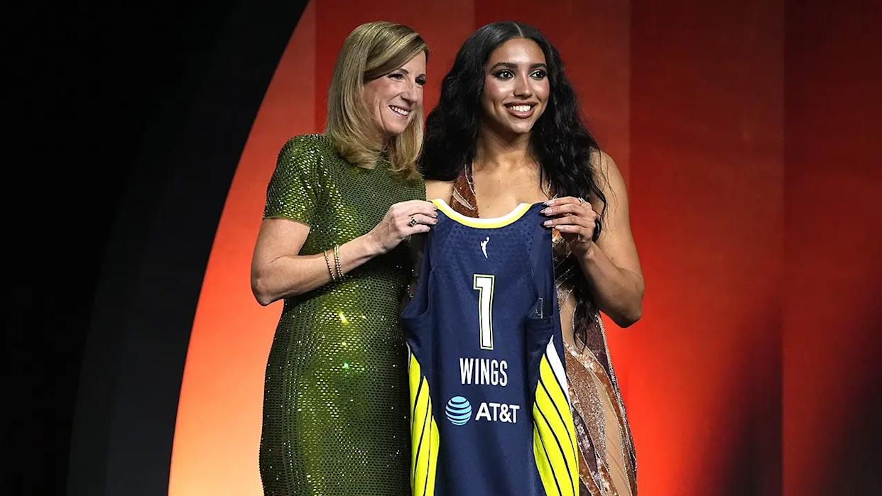 Azzi Fudd posing with WNBA Commissioner Cathy Engelbert after being selected by Dallas Wings