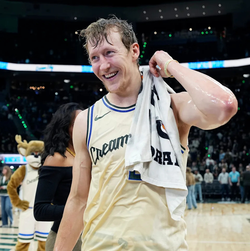 Milwaukee Bucks guard AJ Green (20) smiles after teammates celebrated him setting a franchise record by making 11 3-pointers against the Brooklyn Nets on Friday April 10, 2026 at Fiserv Forum in Milwaukee, Wisconsin.
