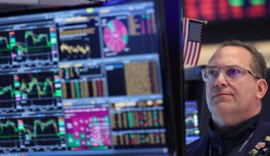 Stocks edge up, oil hovers around $100 a barrel after U.S. begins partial blockade Strait of Hormuz