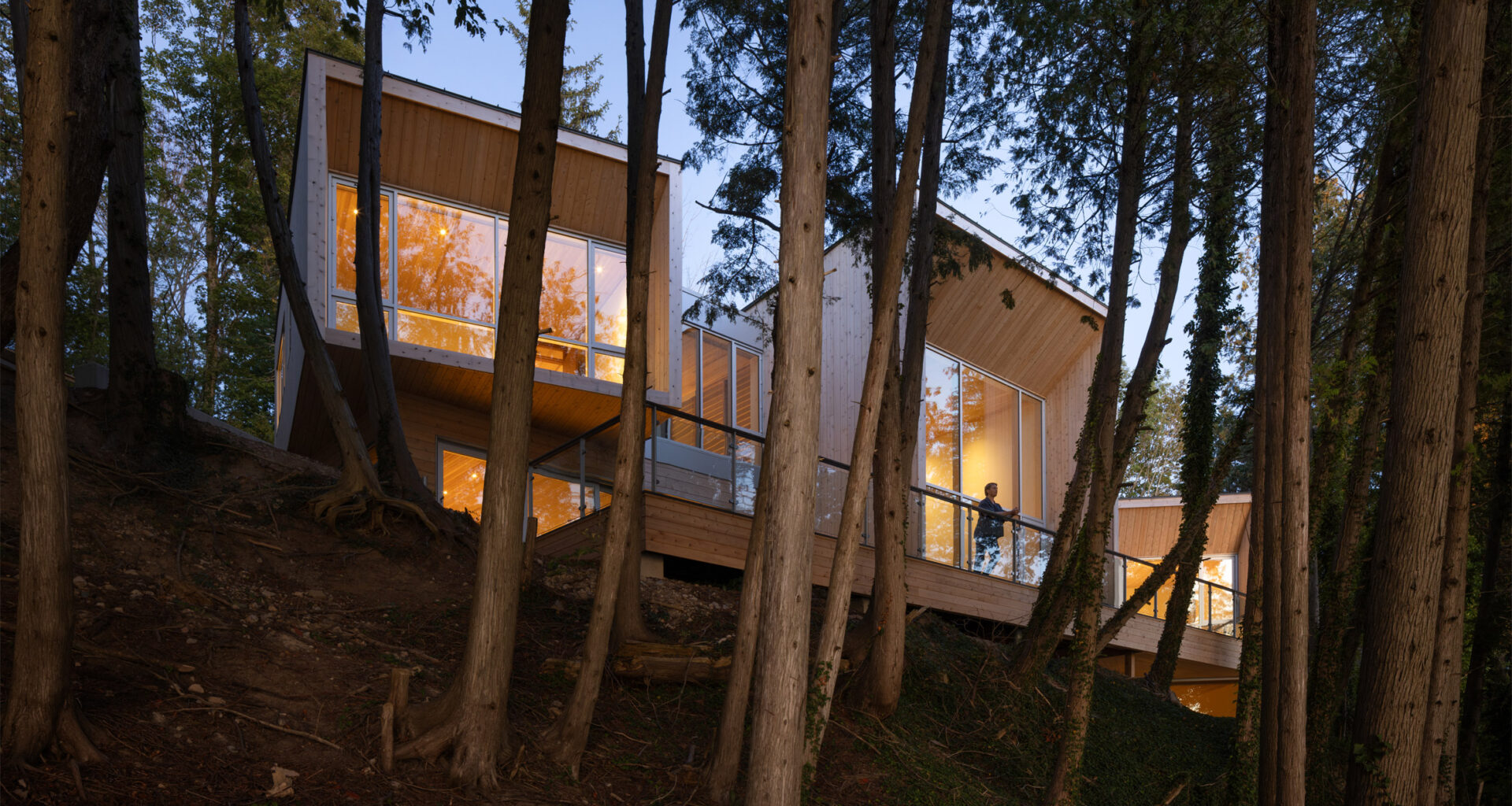 Omar Gandhi cascades cedar lake house down Canadian hillside