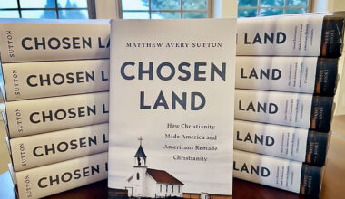 A closeup of a pile of the book 'Chosen Land' by WSU's Matthew Avery Sutton.