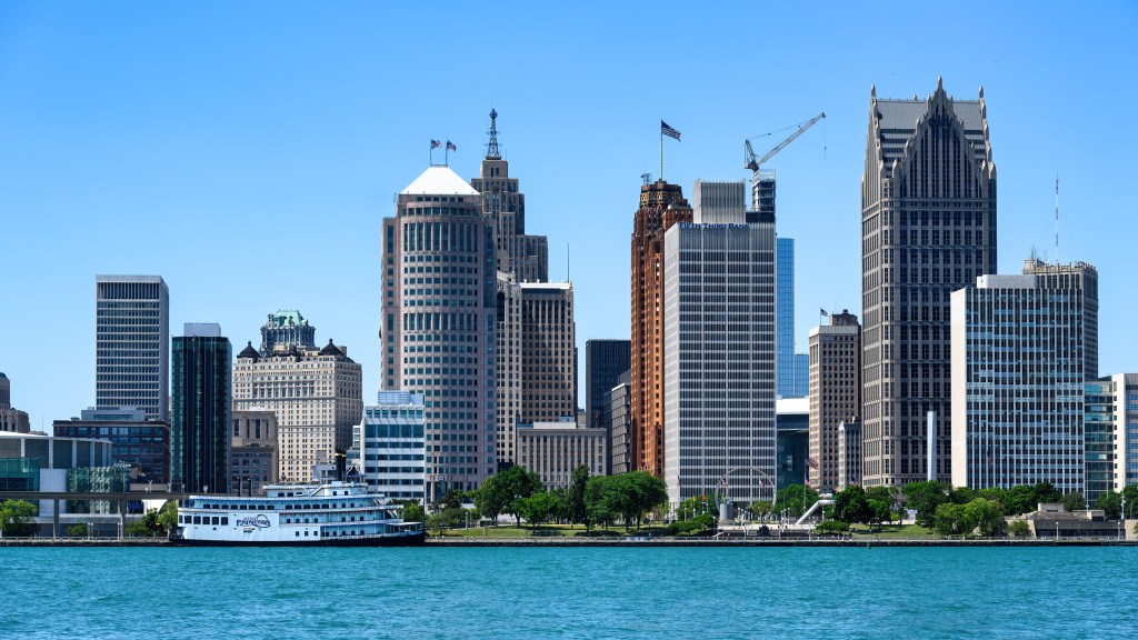 Detroit cityscape and urban skyline along the Detroit River waterfront.