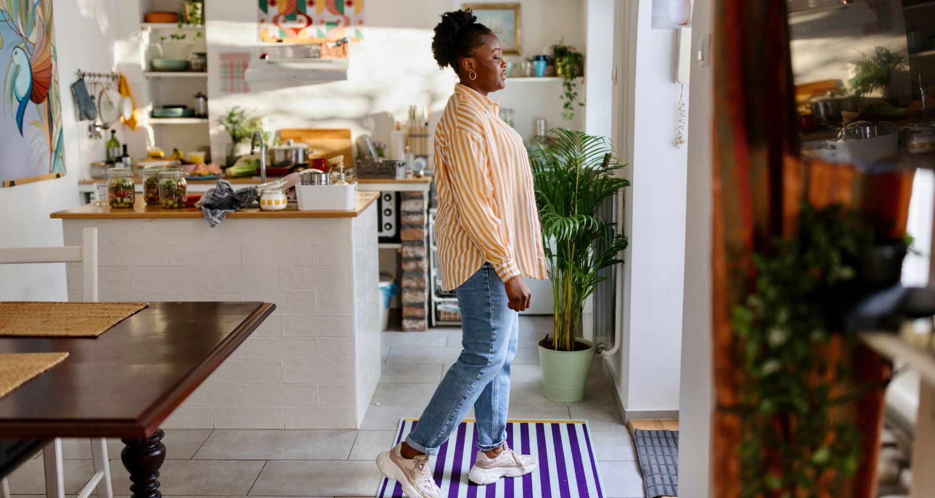 Woman doing ageing test at home in kitchen