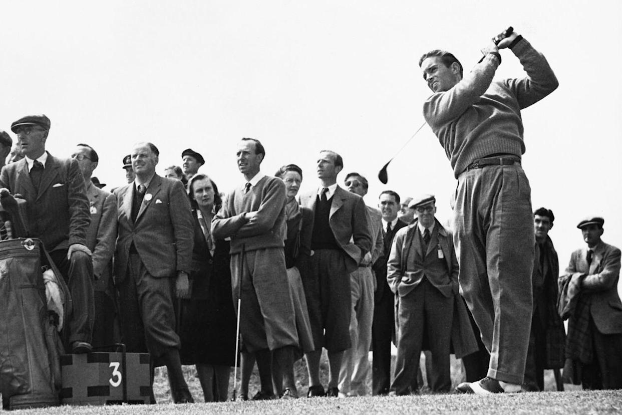 A crowd of spectators watch as Frank Stranahan from the United States drives off the 14th tee during the 1948 British Amateur Championship golf tournament on May 28, 1948.Credit: Ron Ockinden/Central Press/Hulton Archive/Getty