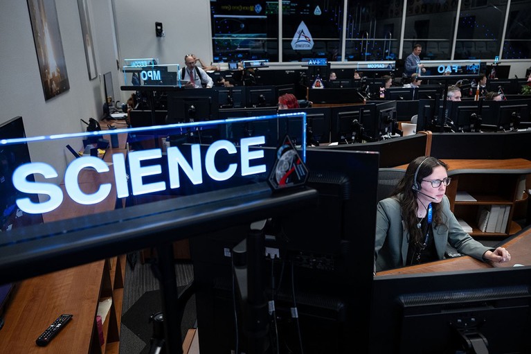 Artemis II science officer Kelsey Young monitors operations at the new SCIENCE console in NASA's Mission Control Center.