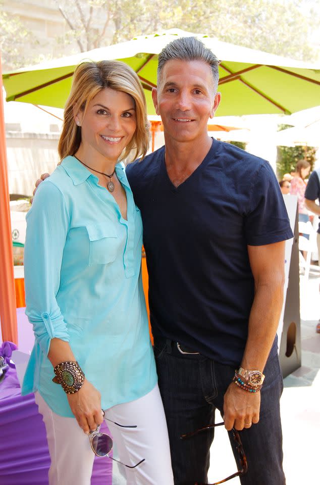 Lori Loughlin and Mossimo Giannulli in 2012.Credit: Getty