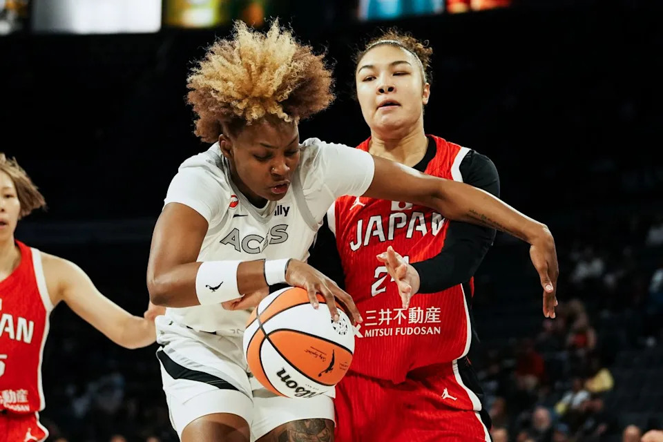 Las Vegas Aces forward NaLyssa Smith (3) drives towards the basket while guarded by Japan center Kadysha Juna Umezawa (24) during first half of WNBA preseason game on Sunday April 26, 2026 at Michelob Ultra Arena in Las Vegas.
