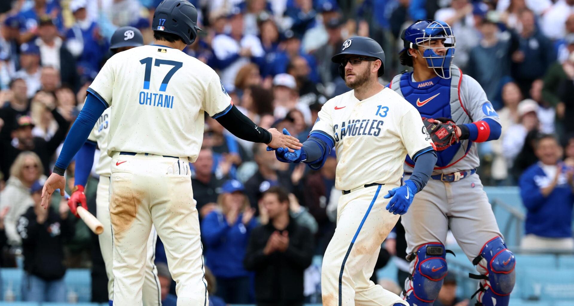 Dodgers score 6 runs in 4th to snap the Cubs' 10-game winning streak with 12-4 victory