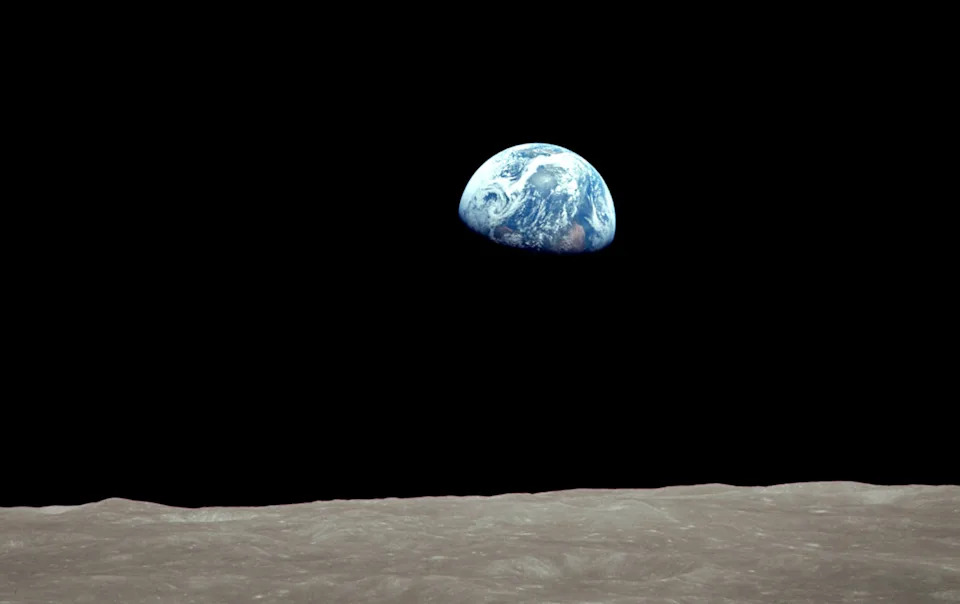 On December 24, 1968 during the Apollo 8 mission, the Earth rose into view over the Moon's limb. (William Anders / NASA)