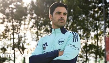 Arsenal manager Mikel Arteta poses with arms folded