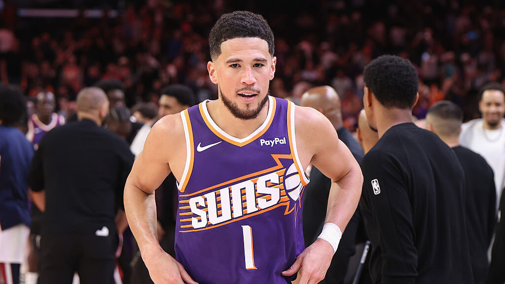 Devin Booker #1 of the Phoenix Suns has been fined by the NBA for criticizing referees....