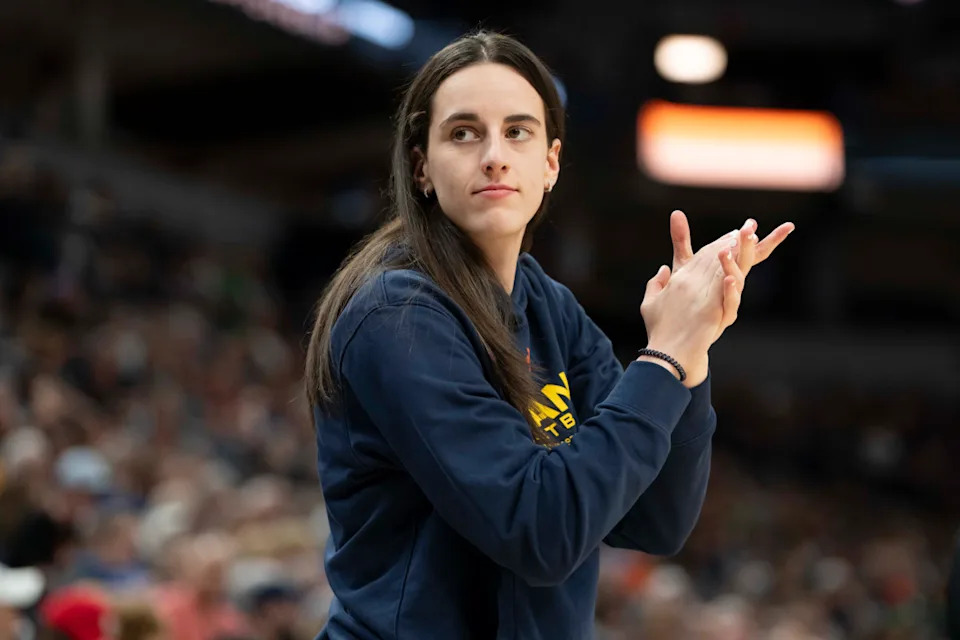 Indiana Fever guard Caitlin Clark reacts on the sideline.Jesse Johnson-Imagn Images