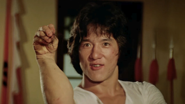 Jackie Chan as Wong, taunting an opponent in Drunken Master