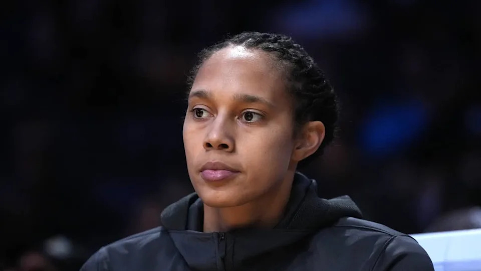 Former Atlanta Dream center Brittney Griner (42) looks on from the sidelines.© Kirby Lee-Imagn Images