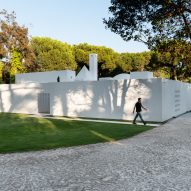 Exterior of Quinta do Lago house by Eduardo Souto de Moura surrounded by pine trees