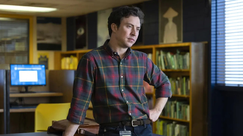 Evan Marquez (Brian Jordan Alvarez) stands uncomfortably in a library in English Teacher